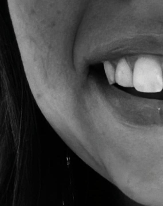 smile with glossy lips 